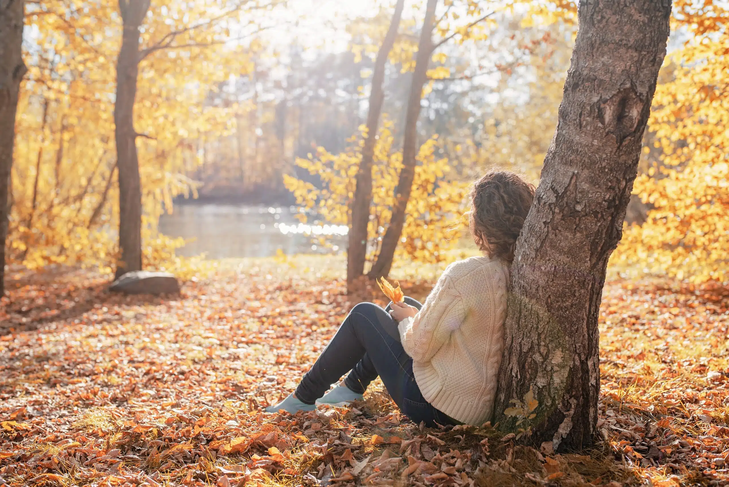 Autumn,Nature.,Young,Thoughtful,Woman,Sitting,By,The,Tree,In